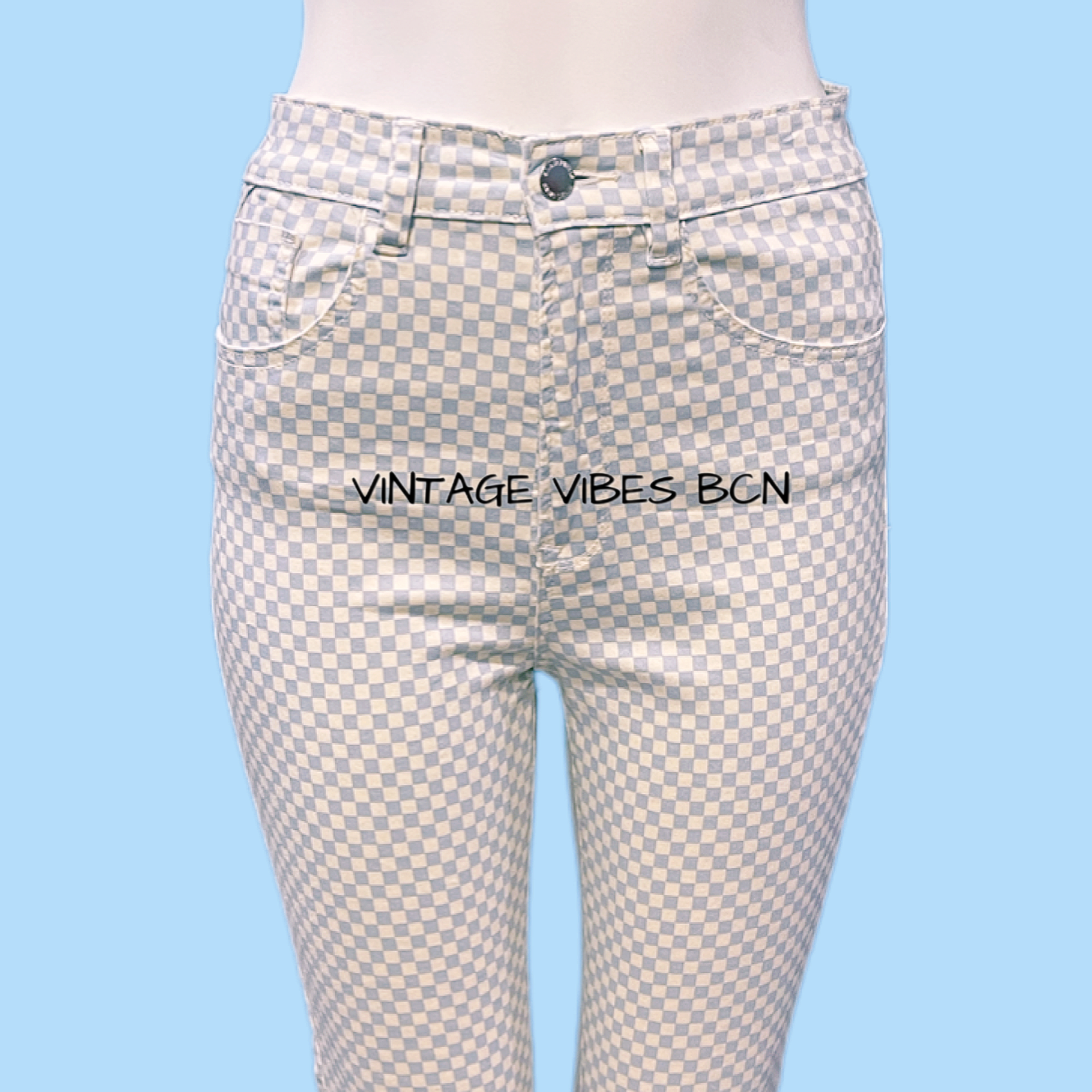 Pantalón pitillo elástico cuadros STRADIVARIUS